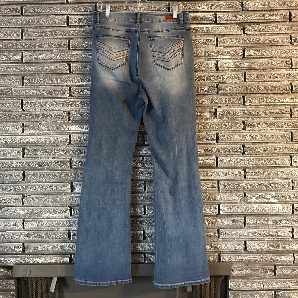 Indigo boot cut jeans.